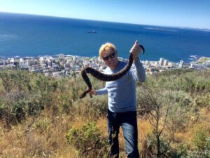 Braam Malherbe holding a snake on appleton